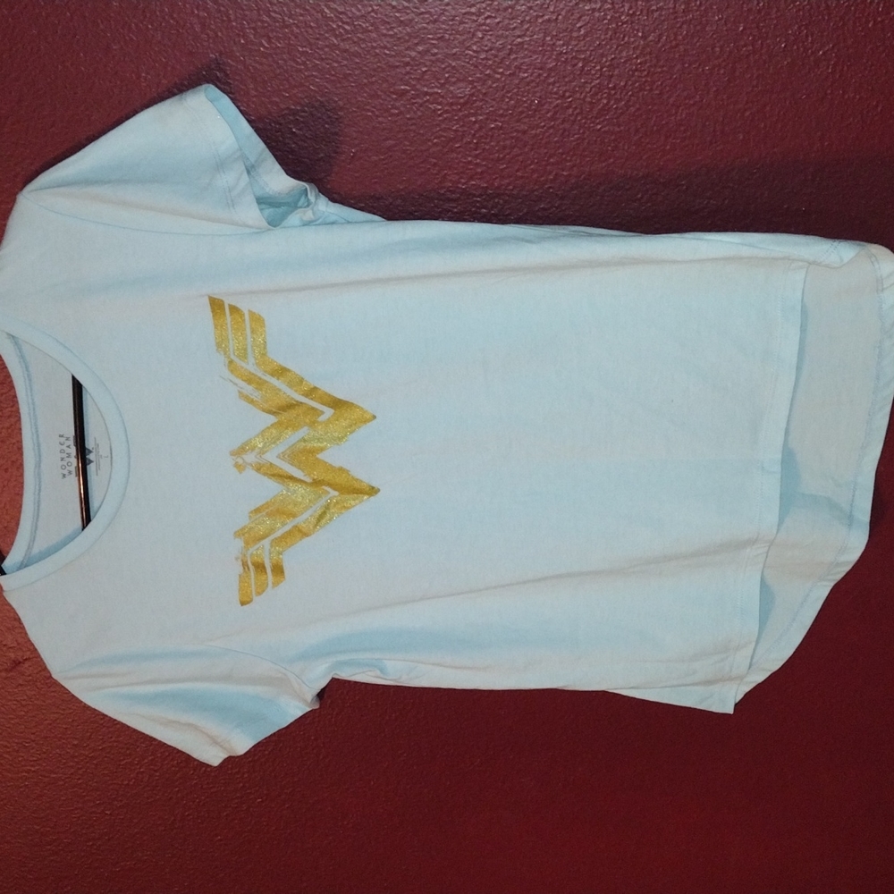 Aqua blue top with gold emblem
